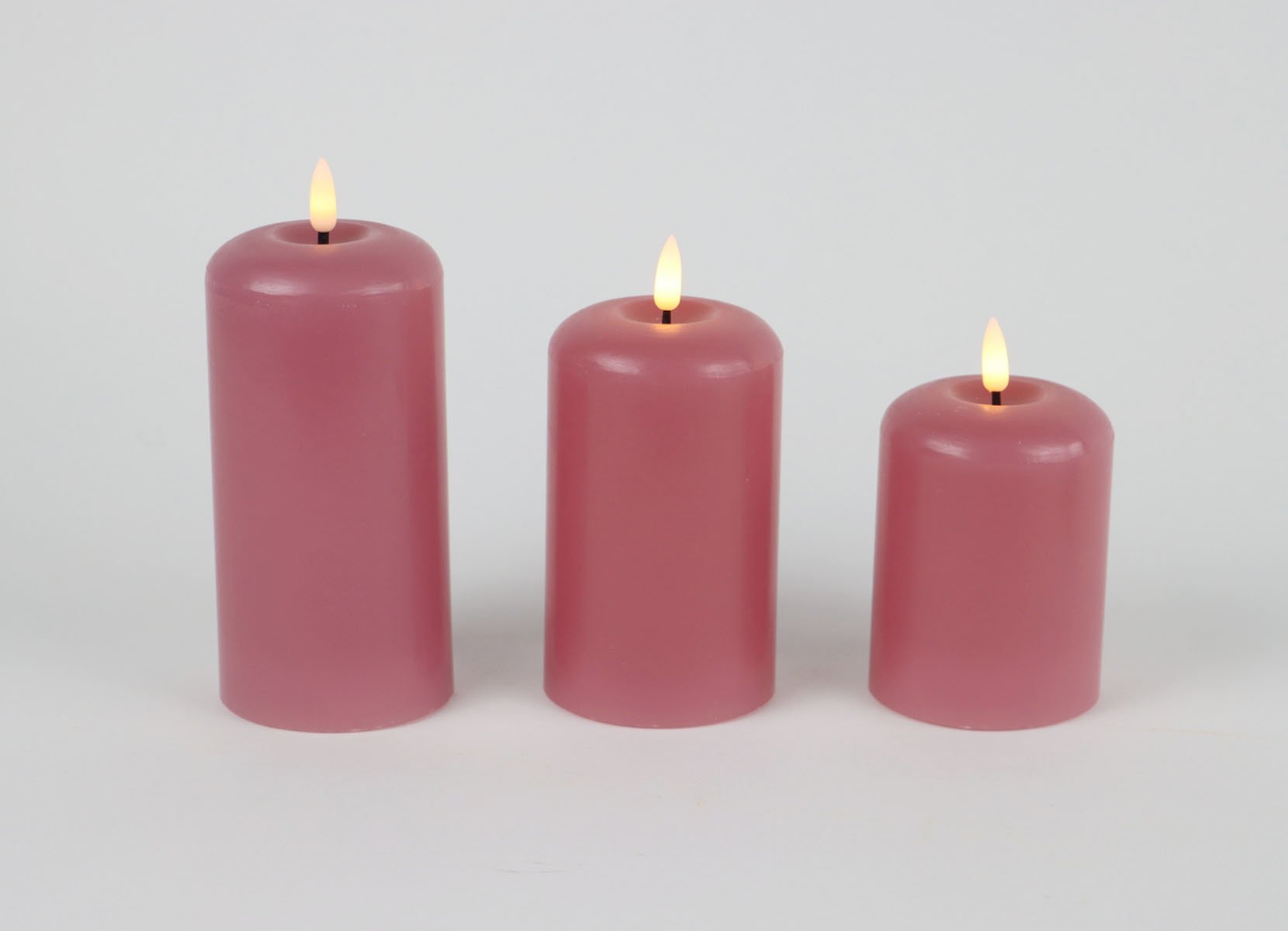 Abgerundete LED-Kerzen aus Echtwachs 3er-Set Rosa